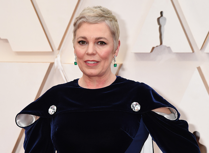 celebrity hair 2020: Olivia Coleman poses on the red carpet in a black gown with blonde hair